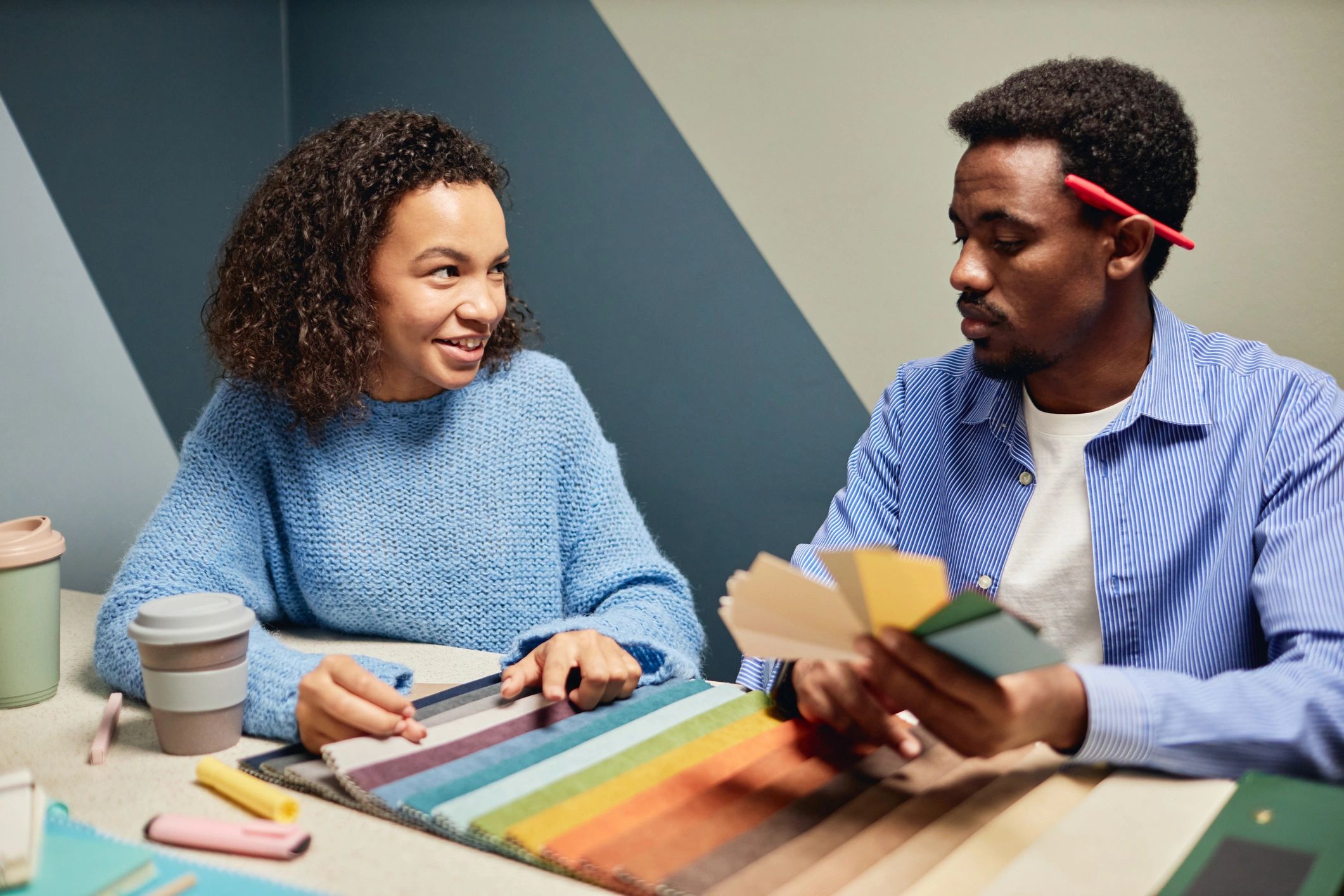 Design professionals reviewing materials for a home-focused project